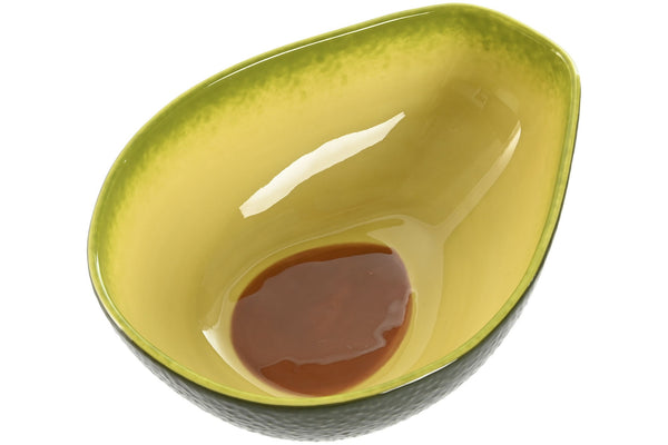 Vista superior del bowl de cerámica en forma de aguacate, detalle del interior en tonos verdes y marrón simulando el hueso