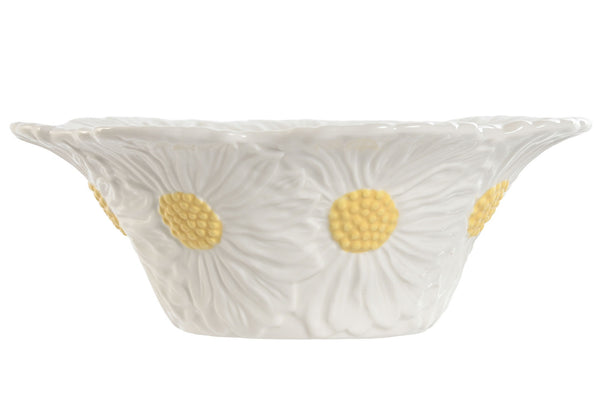 Vista lateral del cuenco de cerámica con diseño de margaritas en relieve, acabado blanco brillante con centros amarillos texturizados