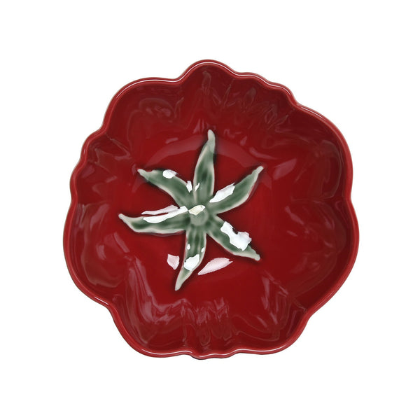 Cuenco de cerámica rojo en forma de tomate con diseño en relieve y hojas verdes en el centro