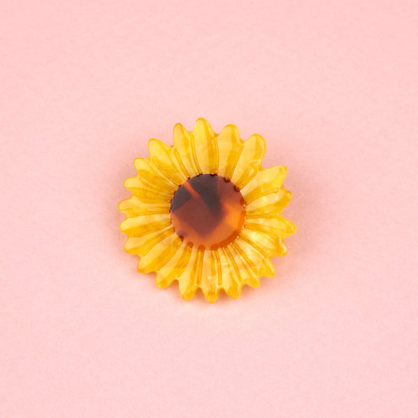 broche girasol Coucou Suzette sobre fondo rosa – Brocantia