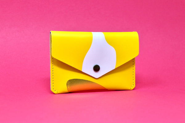 Cartera abstracta amarilla