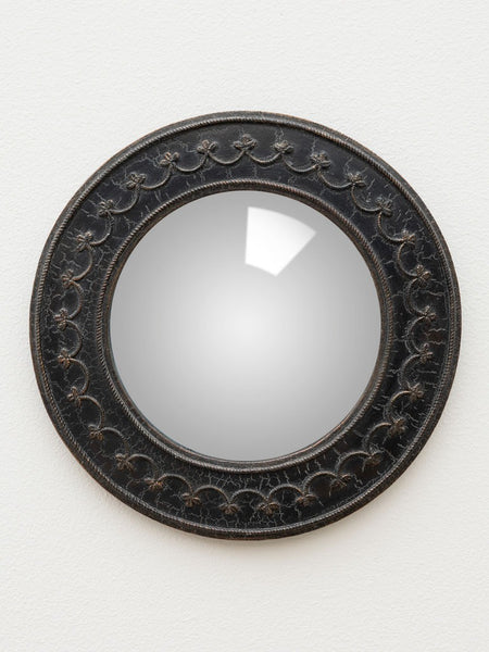 espejo decorativo convexo colgado en pared estilo retro Brocantia