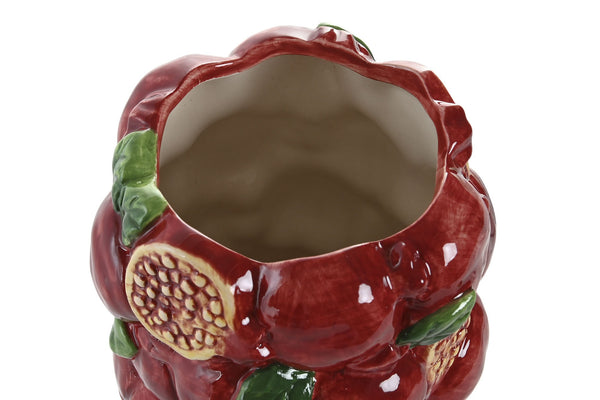 Vista superior de jarrón de cerámica esmaltada con interior beige y relieve de granadas