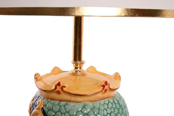 Detalle de la corona de porcelana en forma de base para la lámpara Testa di Moro hombre