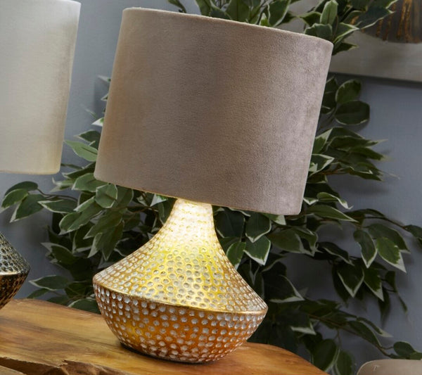 Lámpara de sobremesa dorada puntos