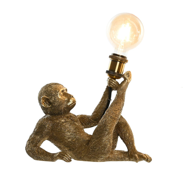 Lámpara de sobremesa mono tumbado dorado claro