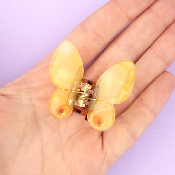 Mini pinza para el pelo mariposa amarilla