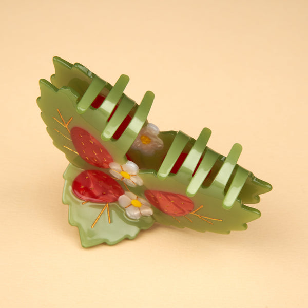 Vista lateral de la pinza de pelo fresas Coucou Suzette mostrando el cierre