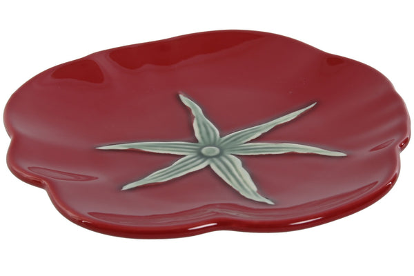 Plato decorativo de cerámica con diseño de tomate visto en perspectiva, ideal para tapas o postres