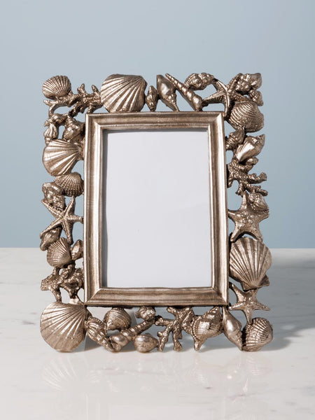 marco de fotos estilo marino con conchas plateadas Brocantia