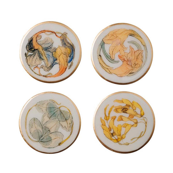Set de cuatro posavasos de metal con ilustraciones botánicas estilo acuarela y borde dorado
