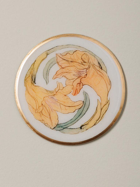 Posavasos de metal con diseño floral amarillo pastel estilo ilustración científica botánica