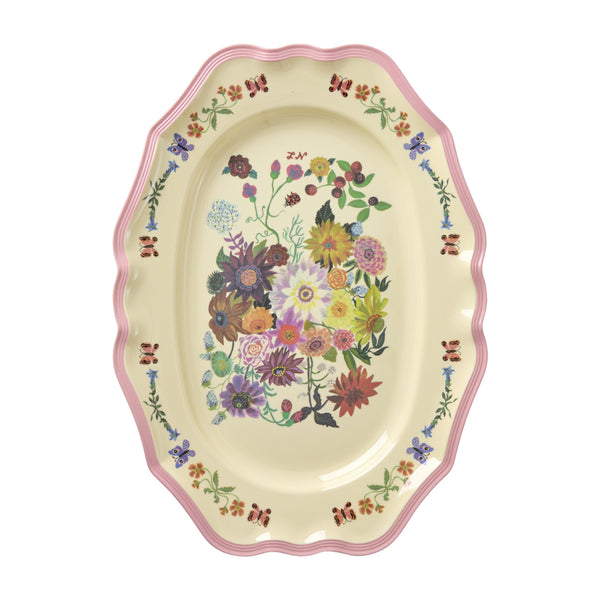 Bandeja de melamina floral ovalada Nathalie Lété con ilustraciones de flores sobre fondo crema y borde rosa – Brocantia