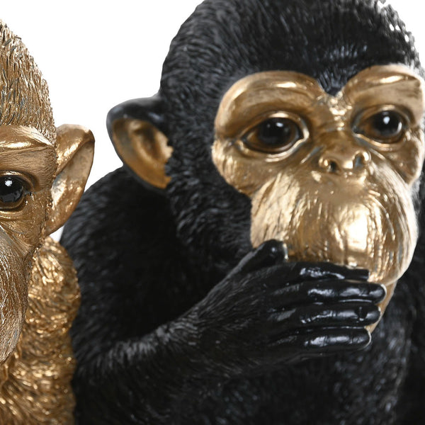 Colección de figuras decorativas de monos en negro y dorado