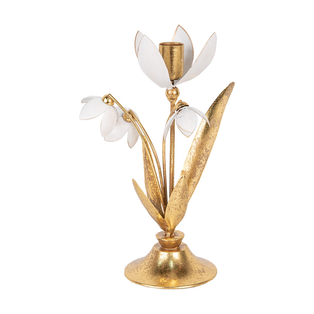 candelabro dorado con flores blancas vintage