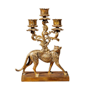 Candelabro decorativo dorado con figura de felino y tres brazos para velas estilo vintage barroco