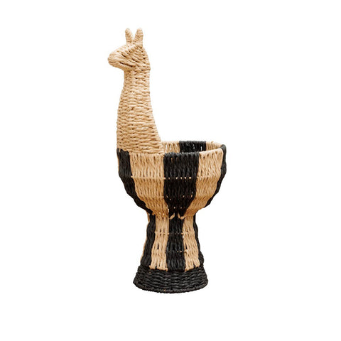 Panera decorativa en forma de llama tejida en fibra natural con rayas negras y crudas