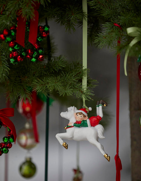 decoración navideña original elfo en caballo blanco