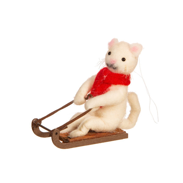 Gatito en trineo con bufanda roja – adorno navideño
