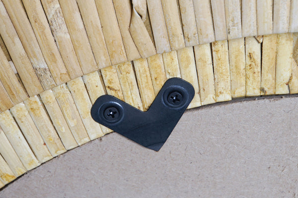 Detalle estructura ratán natural en espejo decorativo