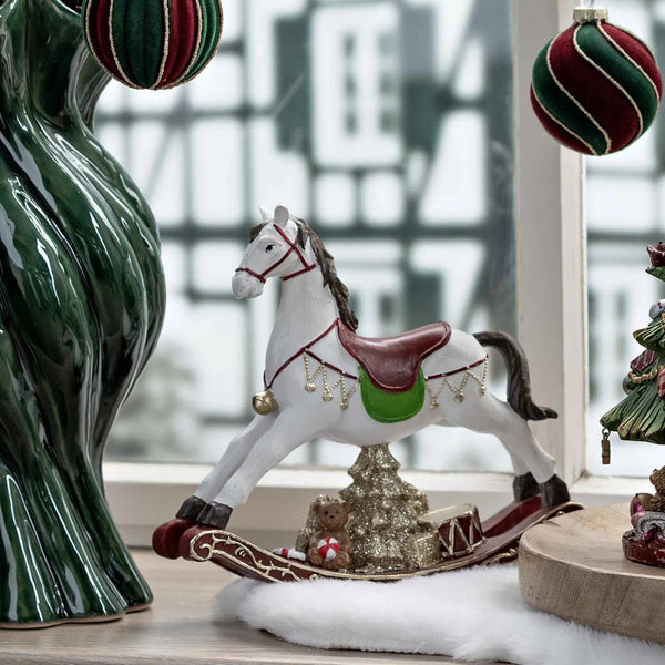 figura de caballo de Navidad con árbol y regalos