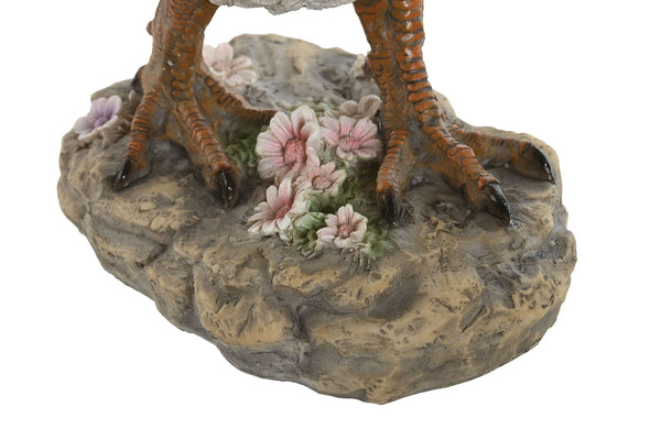 Detalle de base con flores y patas de gallina de resina