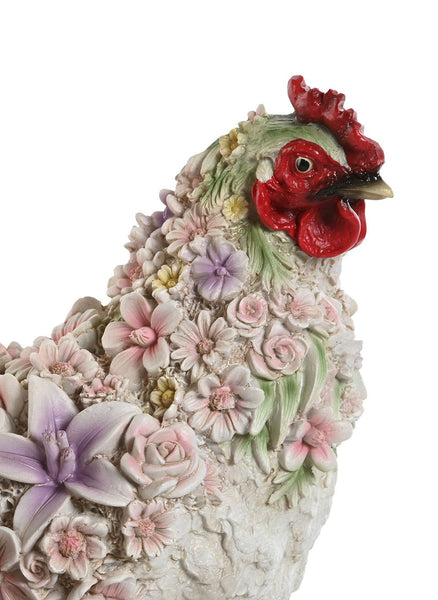 Primer plano de las flores en relieve en la figura de gallina