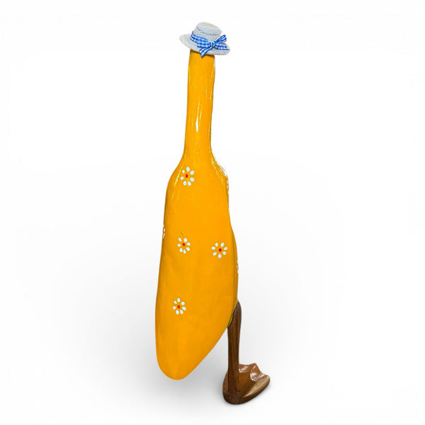 Figura de pato de madera tallada a mano en Indonesia color amarillo