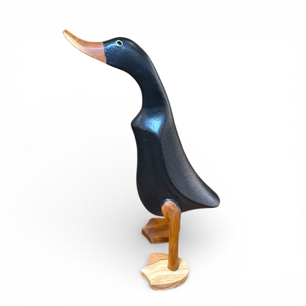 Figura decorativa de pato negro artesanal de madera