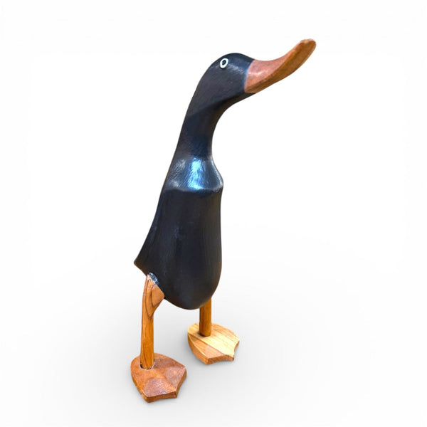 Decoración sostenible: figura de pato negro para estantería