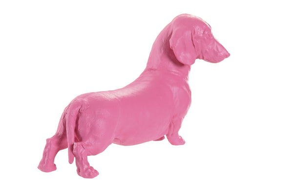 Vista trasera de escultura de perro salchicha rosa