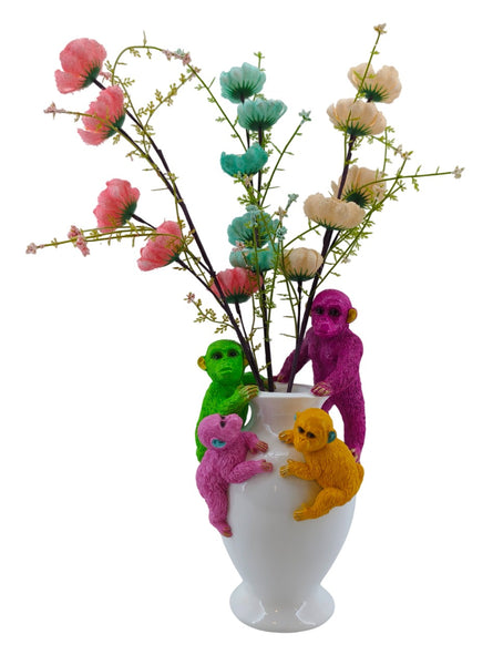 Jarrón decorativo con flores y diseño divertido