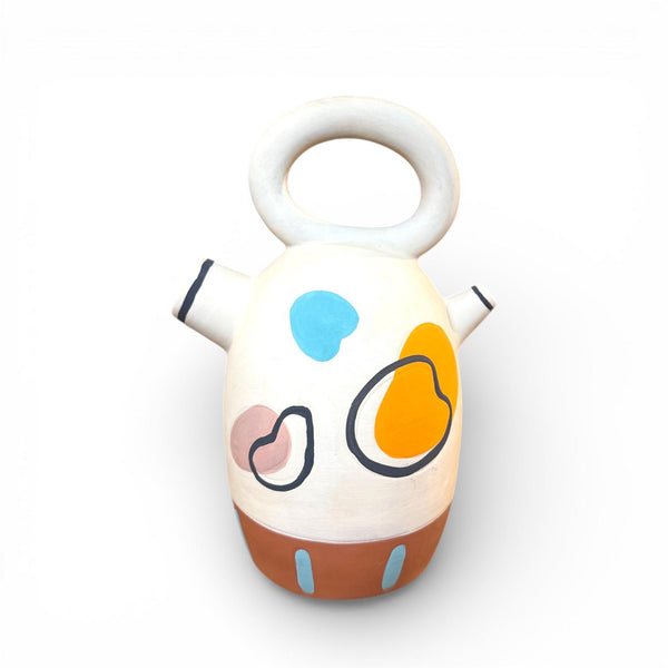 Detalle de botijo artístico en tonos cálidos y pastel