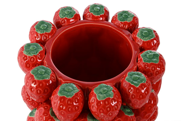 Detalle superior del centro de mesa decorado con fresas de cerámica y acabado artesanal