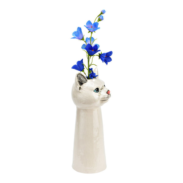 Jarrón decorativo de cerámica con forma de gato blanco y flores azules en la cabeza