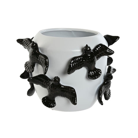 jarrón decorativo bajo de cerámica blanca con golondrinas negras en relieve – vista frontal