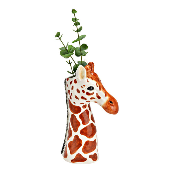 Jarrón decorativo en forma de jirafa con ramas de eucalipto como florero original