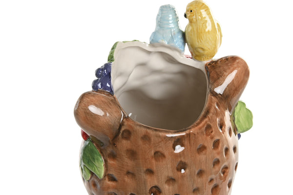 Vista superior del jarrón leopardo mostrando la abertura para flores u objetos decorativos