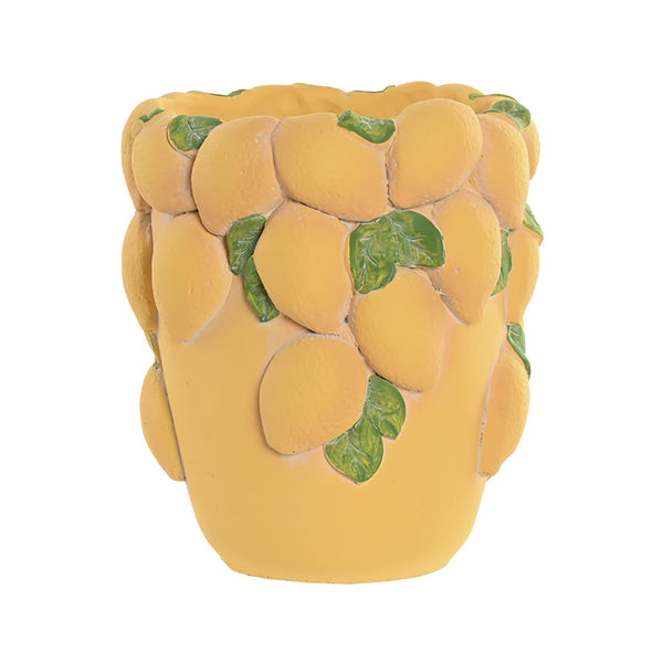 Jarrón de cemento amarillo decorado con limones y hojas verdes en relieve