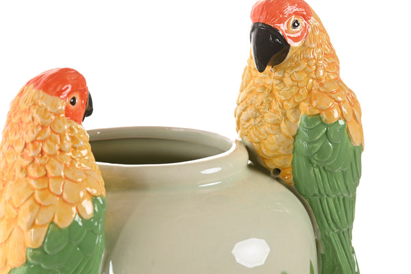 Detalle loros en relieve en jarrón cerámico estilo exótico