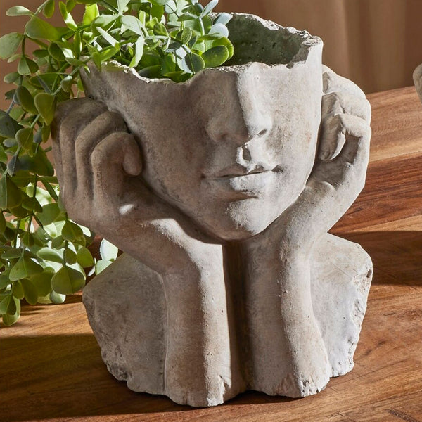 Jarrón efecto piedra con forma de cara artística