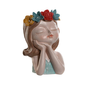 Jarrón niña flores cabeza azul