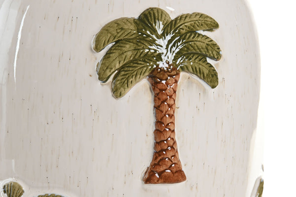 Detalle de palmera en relieve pintada a mano en cerámica