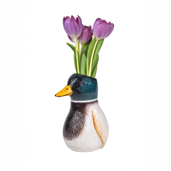Jarrón de cerámica con forma de pato decorado con tulipanes morados