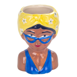 macetero ceramica busto mujer pañuelo amarillo gafas azules