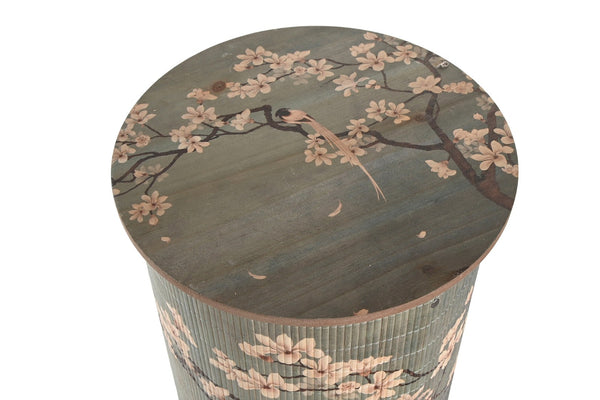 Vista superior de lámpara cilíndrica con estampado floral y ave