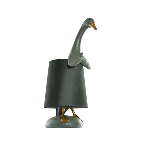 Lámpara decorativa de mesa con forma de pato verde y detalles dorados, diseño original y divertido