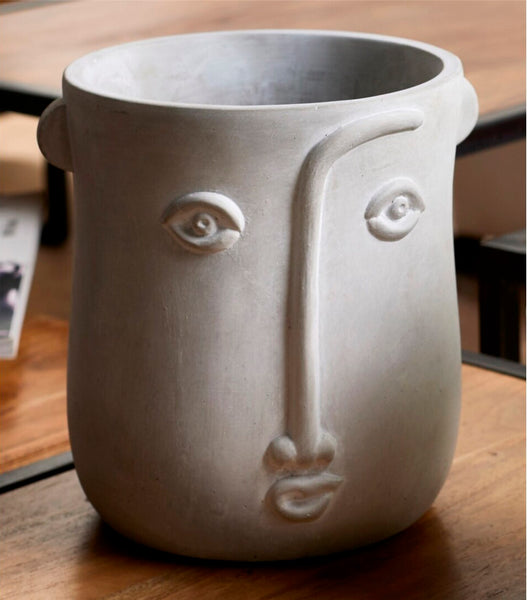 Macetero cara gris