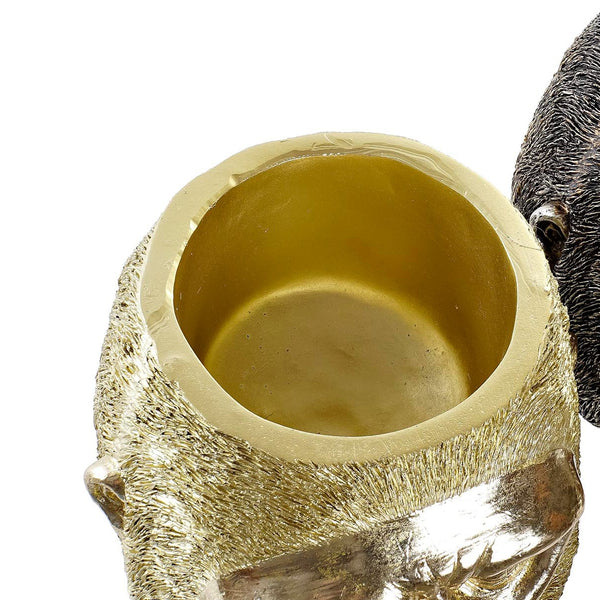 detalle macetero gorila dorado textura y acabado