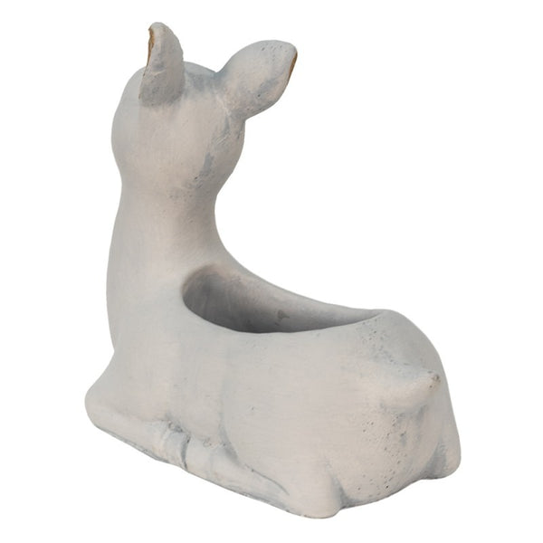 Vista trasera de figura decorativa con forma de ciervo